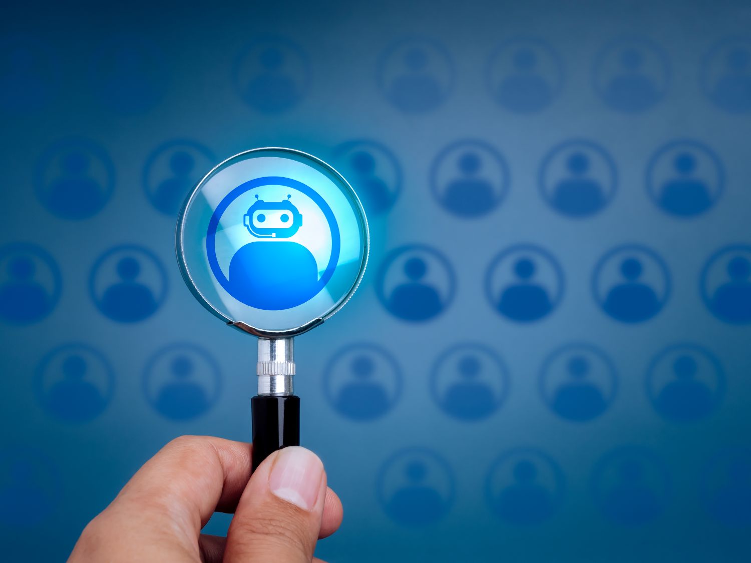 AI recruitment shown by magnifying glass held over a robot